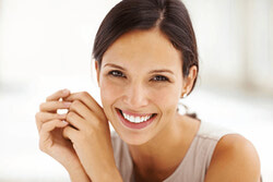 Happy female patient that visits Naturopath clinic