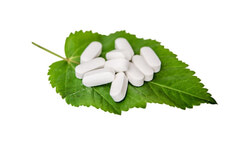Naturopathic remedies on a leaf
